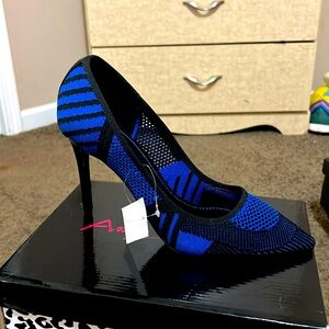 Blue and black pumps